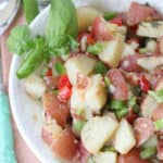 This flavorful Italian Potato salad is always a staple at any summer gathering I host. It's perfect for summer parties, potlucks or just as a simple side dish.....and it has bacon in it! Enough said!