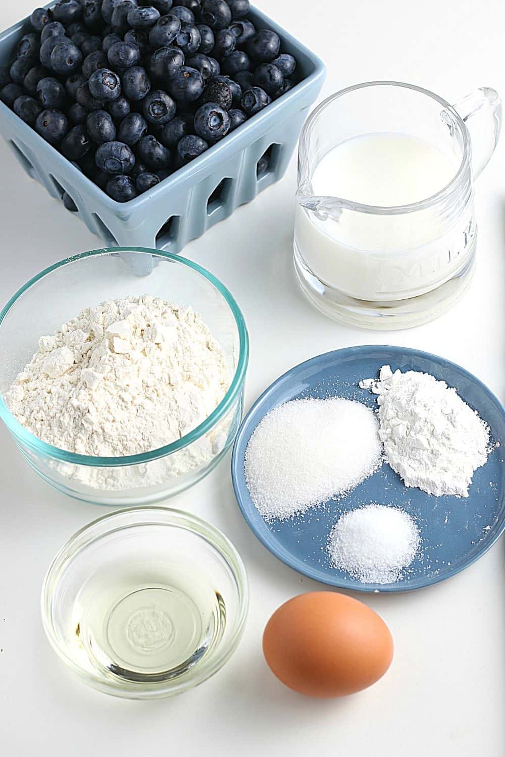 Start your morning off with a delicious batch of Blueberry Buttermilk Pancakes from scratch. This light and fluffy blueberry pancake recipe is perfect for blueberry season or all year round.
