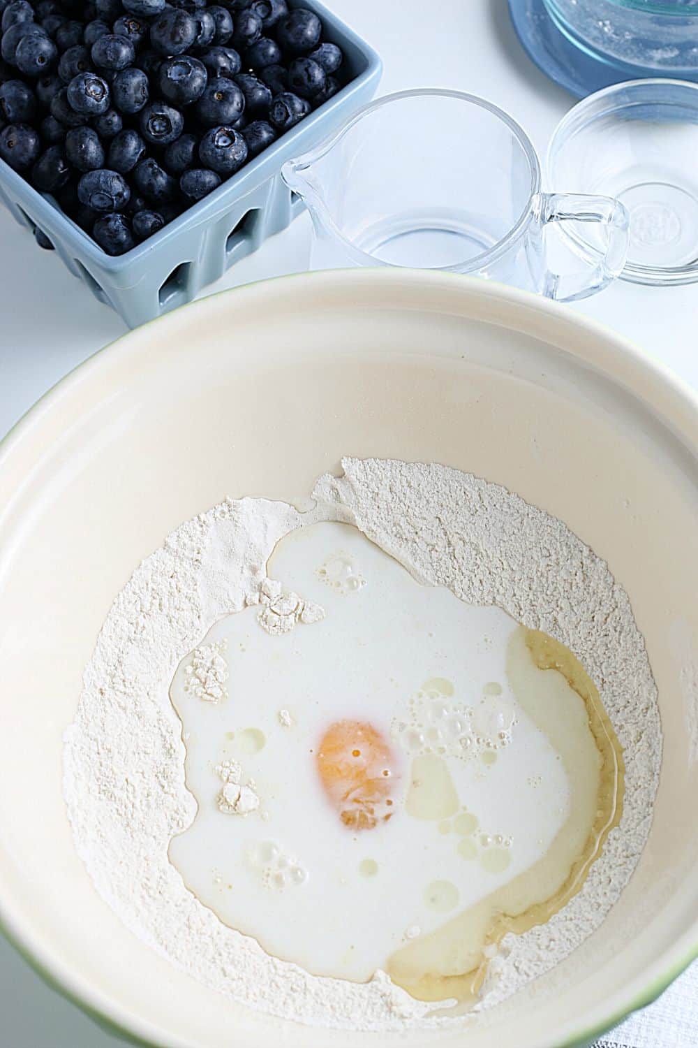 Start your morning off with a delicious batch of Blueberry Buttermilk Pancakes from scratch. This light and fluffy blueberry pancake recipe is perfect for blueberry season or all year round.