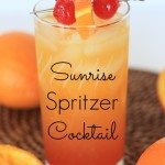 This fruity Sunrise Spritzer Cocktail is a perfect cocktail for a nice brunch or fun get together.