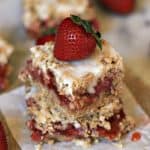 Strawberries and rhubarb are the perfect combination. This Strawberry Rhubarb Oatmeal Bar recipe is easy and delicious! It's a perfect spring dessert. #strawberryrecipes #dessert #baking #rhubarb #dessertrecipes #spring