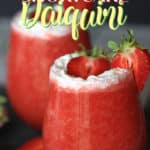 Cheers to Strawberry season. With just a few simple ingredients, you can make your own Strawberry Shortcake Daiquiris at home. Skip the mix and make fresh strawberry daiquiris at home using this easy recipe. It's the perfect slushy cocktail for cooling down in warmer weather! #strawberrydaiquiri #cocktails #slush