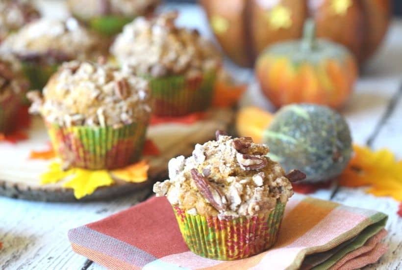 These Pumpkin Pecan Crunch Muffins combine a delicious pumpkin muffin with a crunchy pecan streusel topping. These pumpkin muffins are the perfect snack for any time of the day. #pumpkinmuffins #pumpkinrecipe