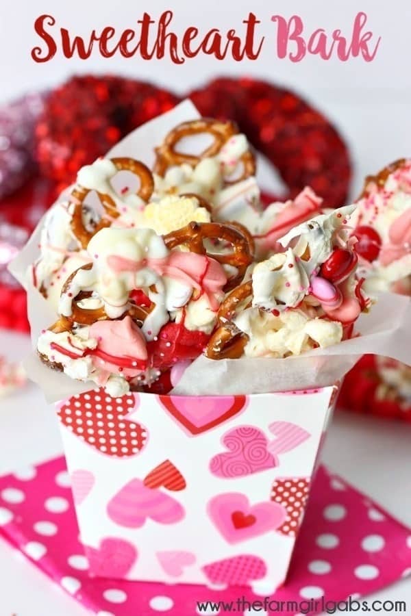 This easy Sweetheart Bark recipe is sure to capture the heart of your Valentine. You can't go wrong with a sweet snack filled with popcorn, pretzels and melted chocolate.