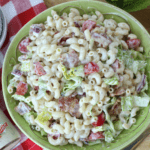 Everything is better with bacon! It's picnic season and this BLT Pasta Salad is the perfect summer salad recipe! This pasta salad recipe is filled with crispy bacon, fresh tomatoes and romaine. It is dressed with Litehouse Ranch Dressing. Save this kicked up macaroni salad recipe for your next backyard BBQ or picnic. #bltpastasalad #BLT #pastasalad #bacon #summersalad #macaronisalad