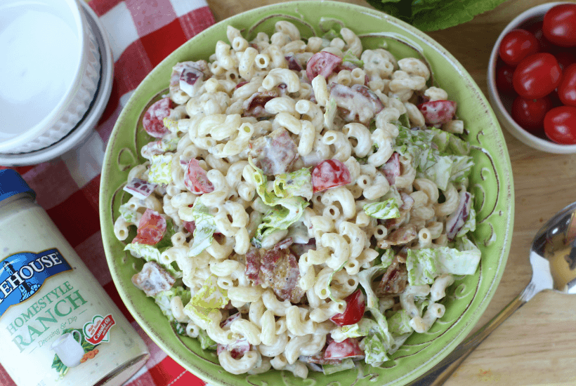 Everything is better with bacon! It's picnic season and this BLT Pasta Salad is the perfect summer salad recipe! This pasta salad recipe is filled with crispy bacon, fresh tomatoes and romaine. It is dressed with Litehouse Ranch Dressing. Save this kicked up macaroni salad recipe for your next backyard BBQ or picnic. #bltpastasalad #BLT #pastasalad #bacon #summersalad #macaronisalad