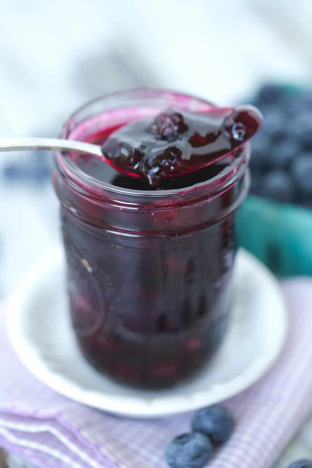 This best Homemade Blueberry Sauce recipe is the perfect topping for ice cream and pancakes as well as many other desserts. This easy blueberry recipe takes just 15 minutes to make.