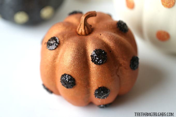 These easy DIY Glitter Glam Pumpkins are a perfect way to add some bling to your fall decor. This easy craft can be customized any way you like.