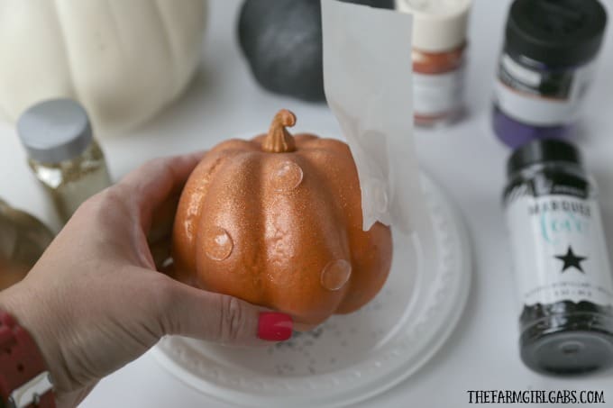 These easy DIY Glitter Glam Pumpkins are a perfect way to add some bling to your fall decor. This easy craft can be customized any way you like.
