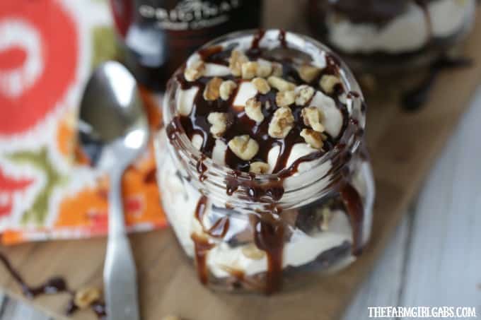 Celebrate St. Patrick's day with a delicious no bake Baileys Brownie Cheesecake In A Jar. You can't go wrong with Baileys Irish Cream and brownie dessert!