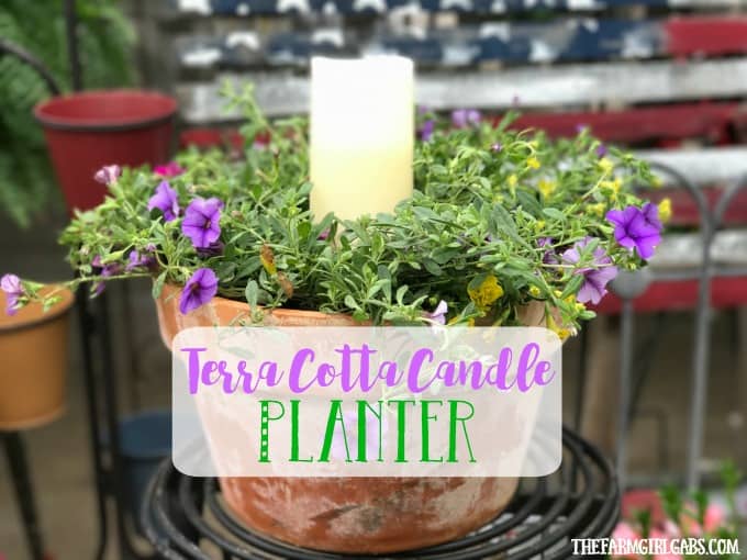 Beautify your backyard decor with this pretty Terra Cotta Candle Planter. This simple DIY candle planter will add some pretty ambiance to your patio.