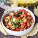 This Pineapple Pico de Gallo is the perfect way to add a sweet and zesty zip to your party. It's the perfect pico de gallo recipe to spice up your summer celebration. #picodegallo #pineapplesalsa #partyrecipe