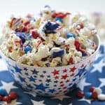 Salute the red, white and blue with this tasty Patriotic White Chocolate Popcorn. This delicious snack is perfect for your next star-spangled party.