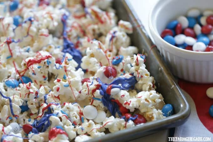 Salute the red, white and blue with this tasty Patriotic White Chocolate Popcorn. This delicious snack is perfect for your next star-spangled party.