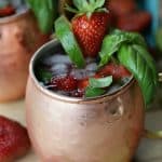 Toast the height of strawberry season with this refreshing Strawberry Basil Moscow Mule drink recipe.