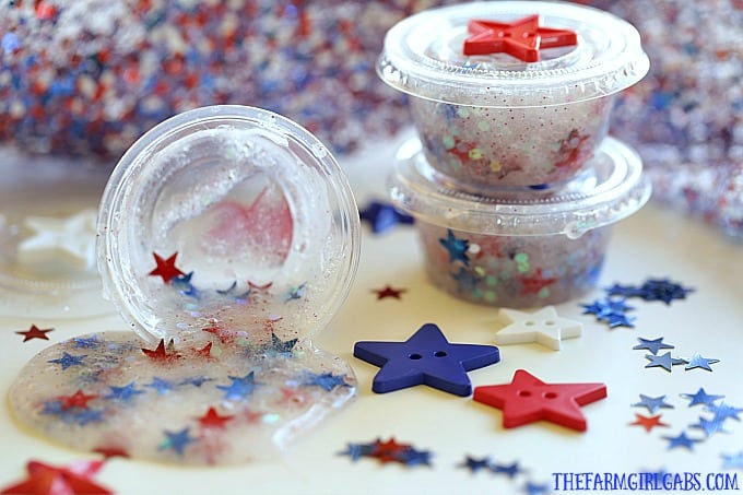 Looking for a fun red, white and blue craft idea to keep the kids busy at your July Fourth Celebration?This Patriotic Party Slime makes the perfect party favor. #slimerecipe #slime #4thofjulycraft