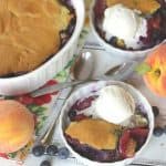 Blueberries and peaches are the fruits of summer! This pair up in this easy cobbler recipe to make this delicious Blueberry Peach Cobbler. This homemade cobbler recipe is a perfect way to enjoy their summer bounty! Read this post for how to make a simple blueberry peach cobbler from scratch.
