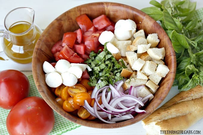 Tomato season call for a delicious Jersey Fresh Panzanella Salad. Ripe juicy tomatoes pair up with rustic french bread to create a delicious summer salad.