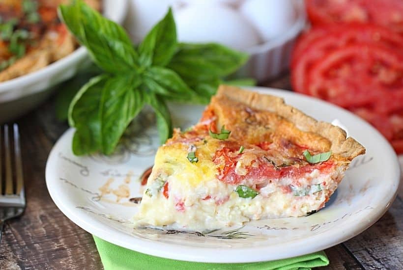 Tomato lovers rejoice! This easy Summer Tomato Pie recipe (or tomato quiche) is perfect for brunch, lunch or dinner. It's a great way to use all those ripe tomatoes from your garden or local farmers' market.
