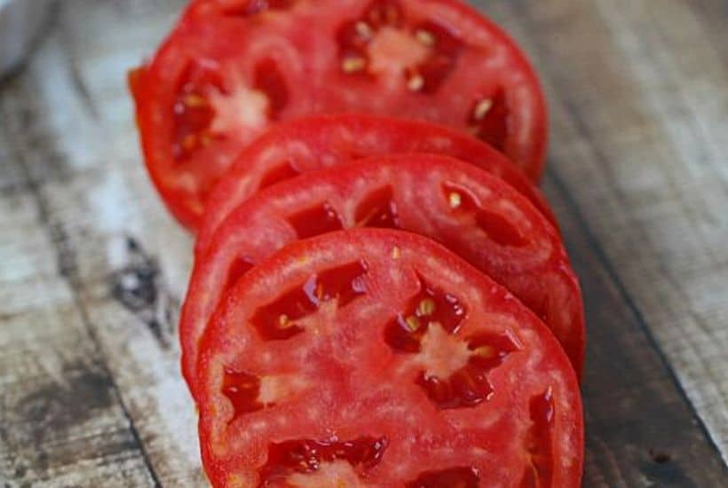Tomato lovers rejoice! This easy Summer Tomato Pie recipe (or tomato quiche) is perfect for brunch, lunch or dinner. It's a great way to use all those ripe tomatoes from your garden or local farmers' market.