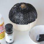Oh boy! Make your Disney Halloween swell with this easy DIY Mickey Mouse Glitter Pumpkin.