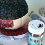 Oh boy! Make your Disney Halloween swell with this easy DIY Mickey Mouse Glitter Pumpkin.