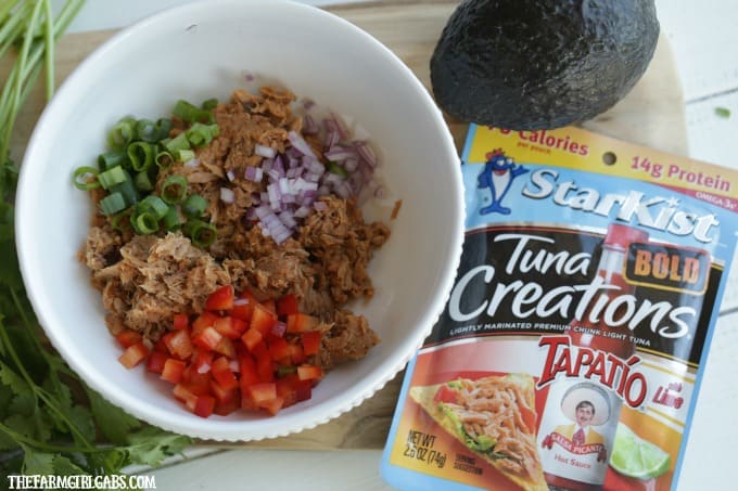 Bold & Balanced. This Spicy Tuna Stuffed Avocados recipe has plenty of bold flavor balanced by the cool avocado. Add some zip to your lunch or dinner menu with this easy recipe. #TearEatGo #Ad
