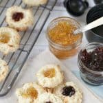 Soft and chewy, these Coconut Thumbprint Cookies are a great addition to your Christmas Cookie recipe routine.