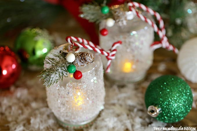This easy DIY Snowy Lantern Ornament will shine brightly on your Christmas tree.
