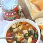 This classic Tuscan Chicken Soup will warm you up on a cold winter's day! This easy soup recipe is filled with hearty vegetables, chicken and tortellini.