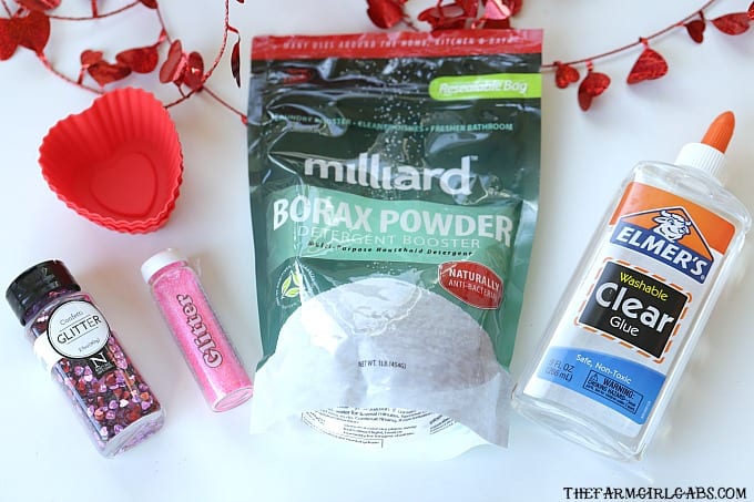 You and your kids will LOVE making this easy DIY Valentine's Day Slime project. This fun craft makes a great party favor too! #Slime #ValentinesDay #Crafts #DIY #Kids #KidsCrafts #PartyIdeas
