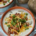 You won't be able to resist the soul-soothing comfort of this delicious Loaded Baked Potato Soup recipe. #Soup #BakedPotatoSoup #Recipe #ComfortFood #LoadedBakedPotatoSoup #SoupRecipe