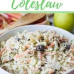 Coleslaw isn't just for picnics. Take your coleslaw to a new level with this tasty Apple Raisin Coleslaw. This recipe is the perfect side dish to serve any time of year. Ready in just 10 minutes, this delicious coleslaw recipe is topped with a creamy homemade dressing. It's the perfect blend of sweet and savory. #coleslaw #easyrecipe #southerncoleslaw