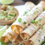 These Baked Buffalo Chicken Flautas as crispy, cheesy and full of buffalo chicken flavor. Feed a crowd this Cinco de Mayo with these delicious Baked Buffalo Chicken Flautas.