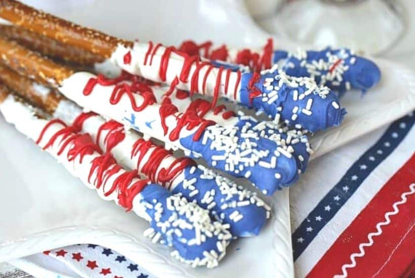 How about a fun patriotic recipe everyone will enjoy? These red, white and blue Stars And Stripes Dipped Pretzels will be a hit at your next patriotic celebration. This dipped pretzel recipe is easy to make and is perfect to serve at a party.