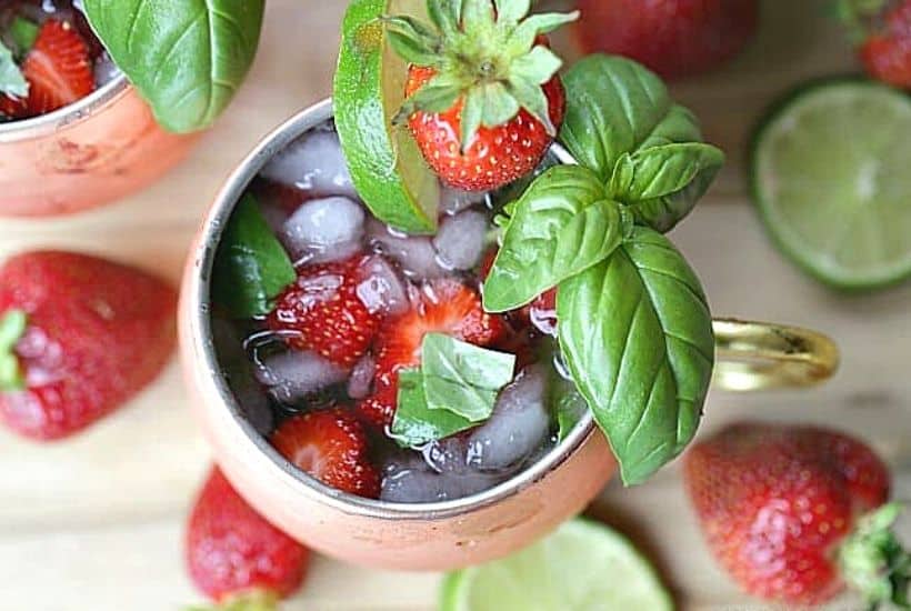 This simple Strawberry Basil Moscow Mule is a refreshing drink recipe. Grab your copper mugs and make this easy cocktail recipe.