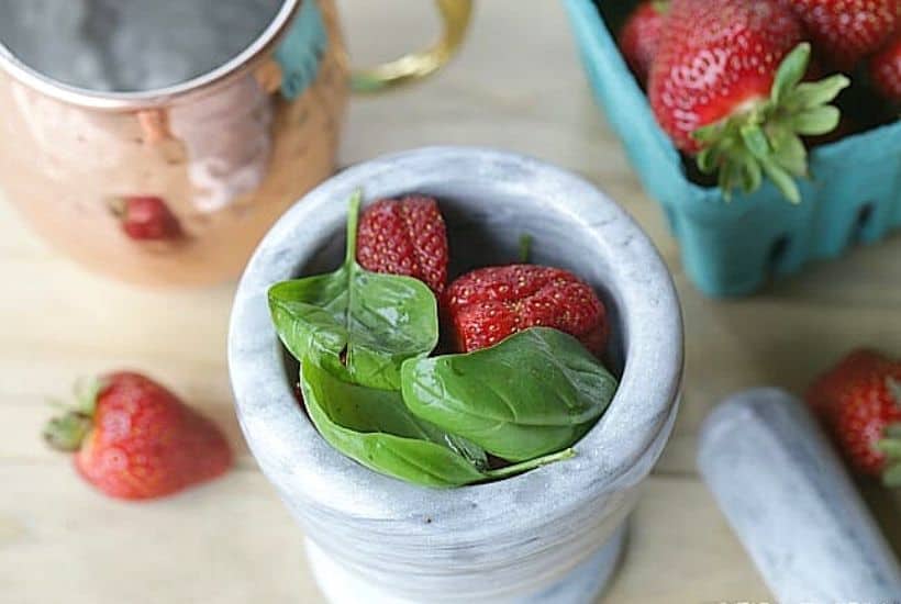 This simple Strawberry Basil Moscow Mule is a refreshing drink recipe. Grab your copper mugs and make this easy cocktail recipe.