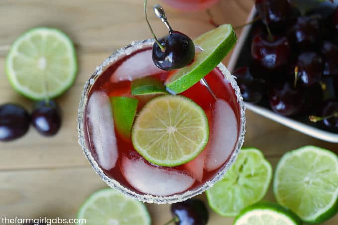 Ready for the perfect summer drink? Mix up a pitcher of this Cherry Margarita Recipe for your next summer celebration. #margarita #cocktails #drinkrecipe #margaritarecipe #cincodeymayo