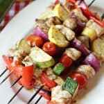 This Italian Herb Chicken Skewers recipe is easy to make and sure to please. Get your grill on and try this tasty recipe. #chickenrecipe #grilling #chickenskewers #kabobs #grilledchicken