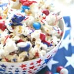 Salute the red, white and blue with this tasty Patriotic White Chocolate Popcorn. This easy popcorn recipe is perfect for a 4th of July Party or patriotic celebration.