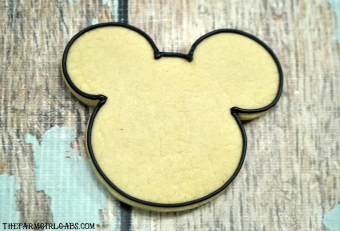 These hauntingly adorable Mickey Mummy Cookies are the perfect Disney Halloween Treat. Make a batch for family and friends to share this Halloween. #Halloween #Cookies #SugarCookies #MickeyMouse #DisneyHalloween #WaltDisneyWorld #Pumpkin
