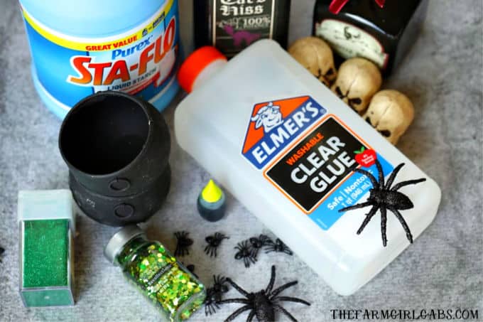 The Sanderson Sisters are at it again. A special mixture of Hocus Pocus, bat wings and bones makes up this spooky Halloween Cauldron Slime. #Slime #SlimeRecipe #Halloween #HalloweenCraft #KidsCraft