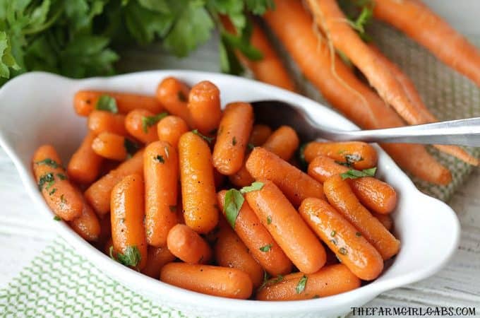These Honey Glazed Carrots are a simple side dish to serve for any meal. They make a great holiday recipe for Thanksgiving and Easter too. #Carrots #SideDish #VegetableRecipe #Thanksgiving #HolidayRecipe