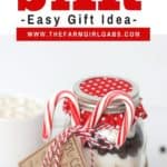 Hot Cocoa In A Jar is a perfect warm-up gift to make this holiday season. This mason jar gift is easy to create and delicious to drink. Make a batch of the Hot Chocolate Mix in a jar for your friends and family. They will love receiving this Hot Cocoa Mix in a Jar as a Christmas gift. #hotchocolate #giftideas #hotcocoamix