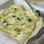 Mashed potatoes are the perfect side dish for meat or poultry. This easy recipe is creamy, buttery and oh so good. This mashed potatoes recipe is a great Thanksgiving side dish too. Super easy and even has a secret ingredient to make this potato recipe extra creamy. Your family will definitely want seconds. Try this easy potato recipe. It is an easy side dish recipe.
