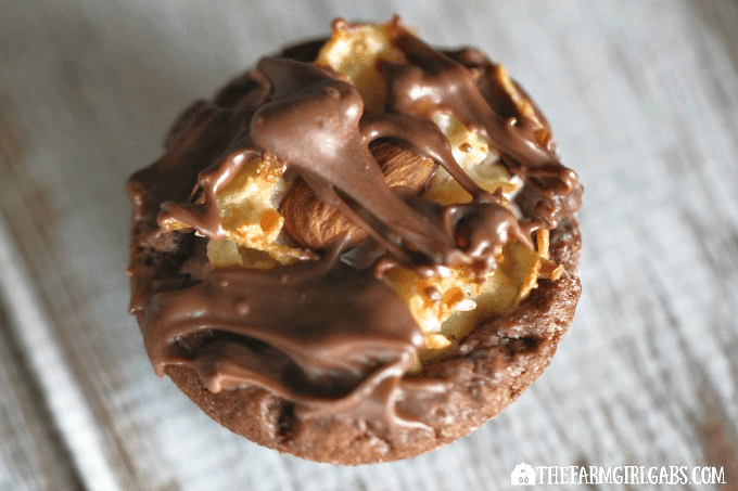 Almond Joy Cups are a delicious cookie cup with a rich chocolate shell and filled with sweet coconut and an almond.