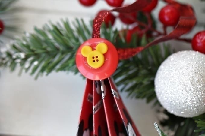 Add a magical touch to your Christmas tree with this easy Disney Accordion Tree Ornaments craft. Kids will love to create these Disney ornaments. #Disney #DisneyCraft #DisneyChristmas #ChristmasOrnaments #ChristmasDecorations #XmasDecor #MickeyMouse