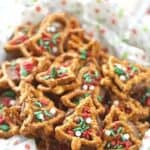 Christmas Rolo Pretzel Candy Sandwiches - Two Ways! A little bit sweet, a little bit salty and oh so good! These pretzel candy sandwiches are a sweet treat. These Rolo pretzel sandwiches can be enjoyed all year long. Add your favorite sprinkles or top this easy dessert recipe with M&Ms. You will enjoy this simple candy treat. These are perfect Christmas treat recipe for a Christmas Cookie Exchange too.