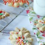 These classic Spritz Cookies are rich, buttery and a must-have cookie for Christmas. Rumor has it that they are Santa's favorite too. #SpritzCookies #ChrismtasCookies #CookieRecipe #holidaybaking #holidayrecipes #Christmascookieexchange #Christmascookierecipe