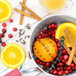 This holiday stovetop potpourri is the perfect blend to make for the holiday season. Make a batch and leave it simmering on your stove all day for an amazing holiday aroma. #Potpourri #StovetopPotpourri #Christmas #ChristmasDecoration #DIY #PotpourriRecipe #SimmeringPotpourri